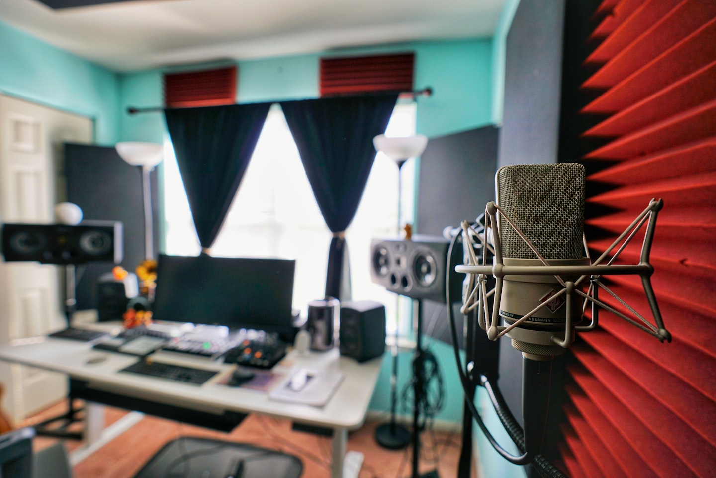 Attractive webcam model working from a clean home studio with professional lighting