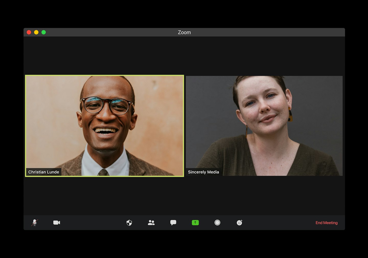 Live video chat interface on a laptop in a modern home office