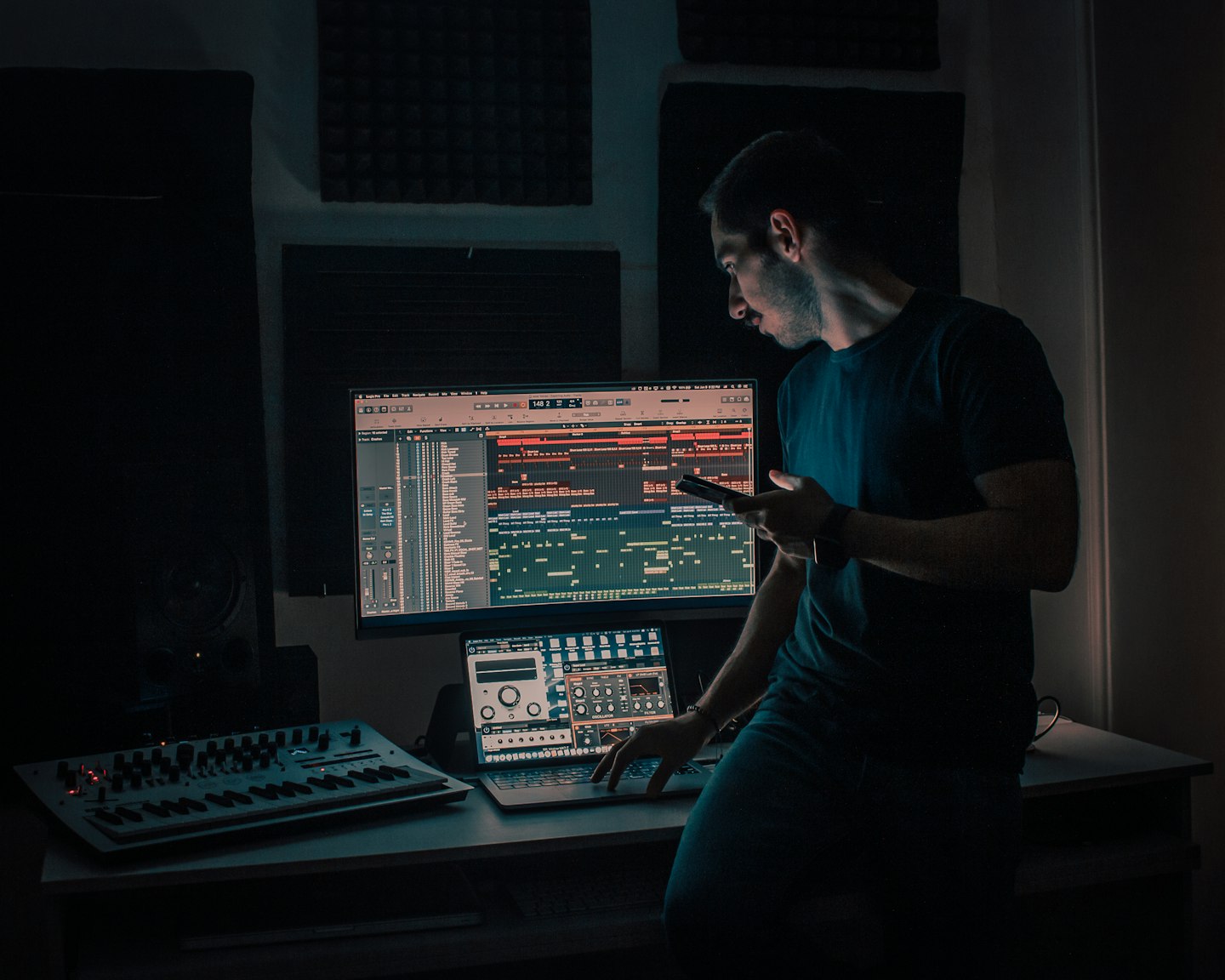 Home studio setup for a cam model with webcam, lighting, and a tidy performance space