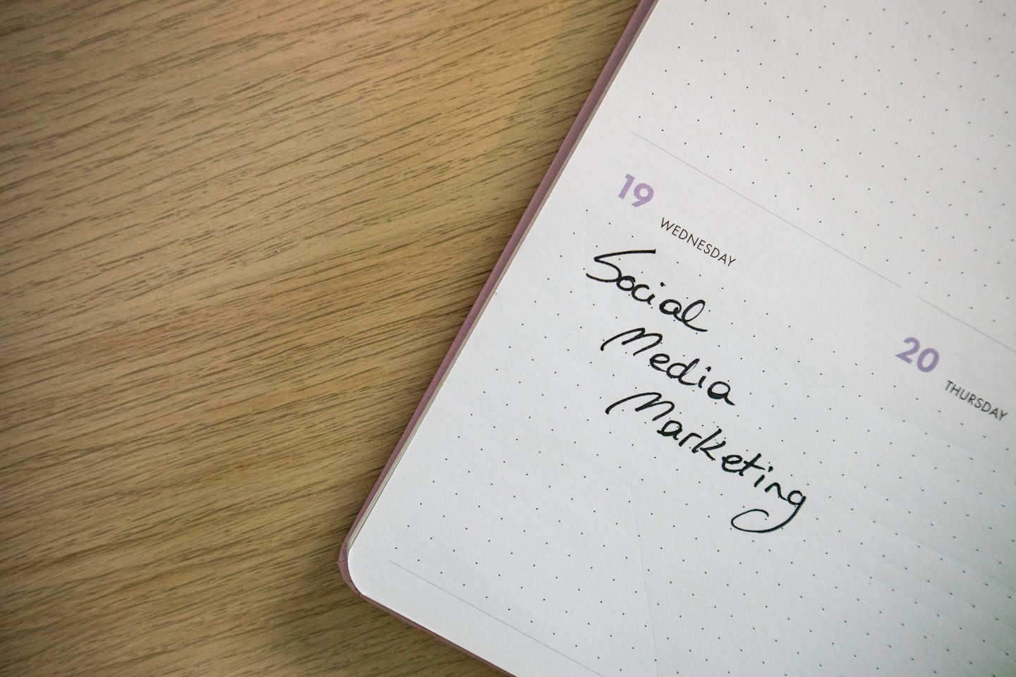 Creator planning live stream promotion content for social media before going live