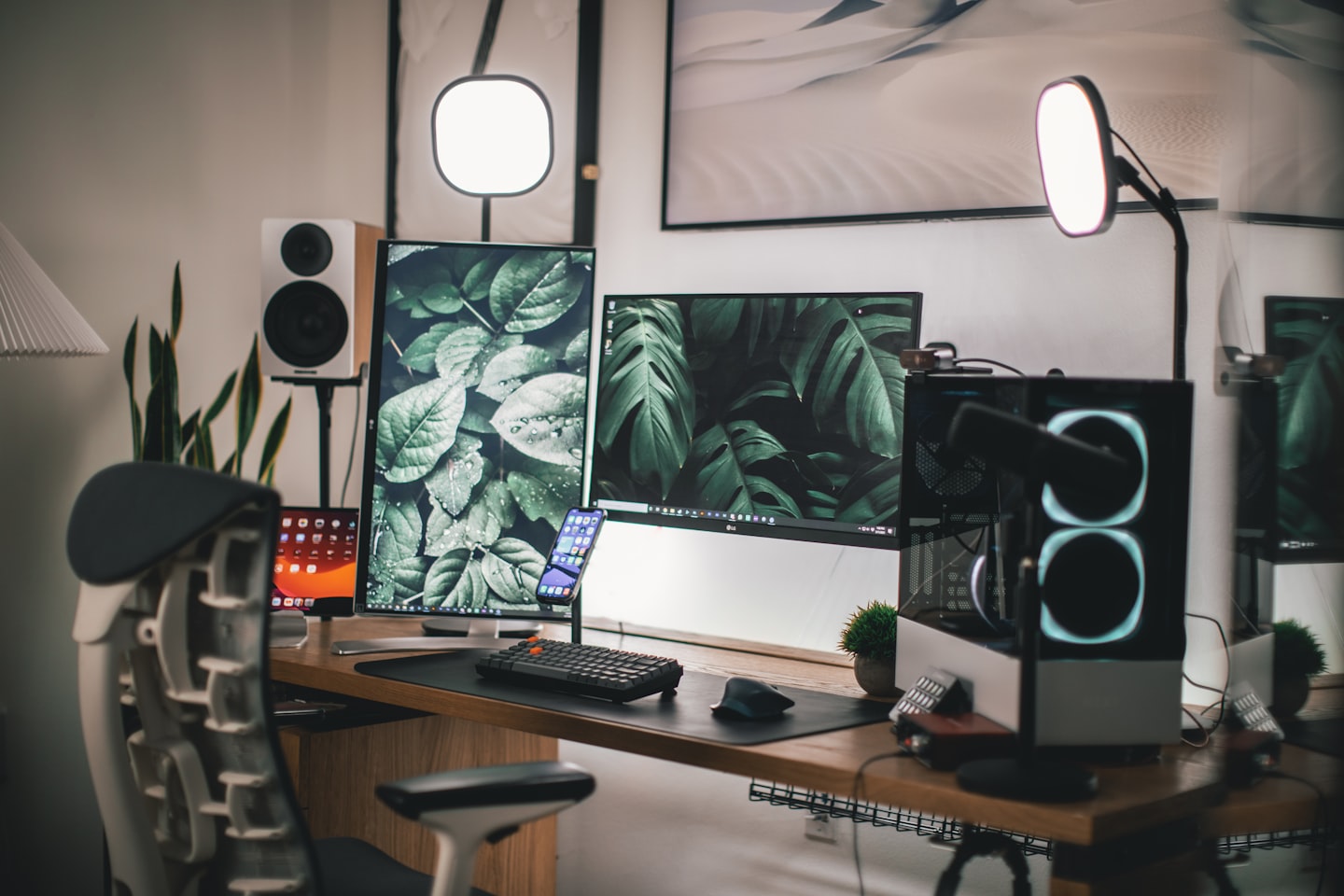 Simple desk setup with a monitor, webcam, and microphone for a beginner streamer